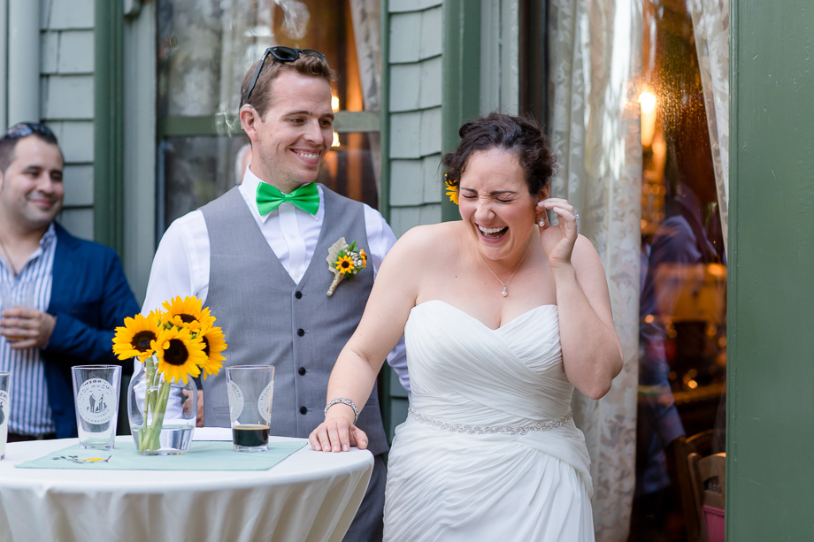 lovely bride cracking up during a speech