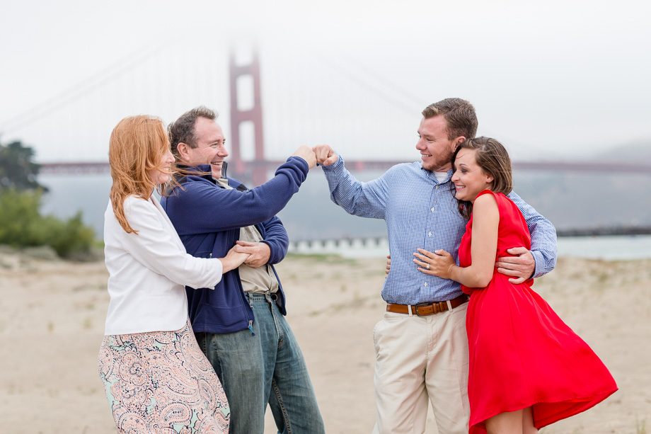 a cute family photo in front of the Golden Gate Bridge