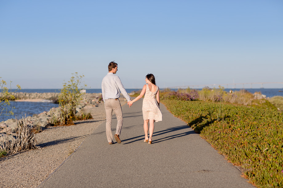 Coyote Point Marina engagement photo - walking by the water