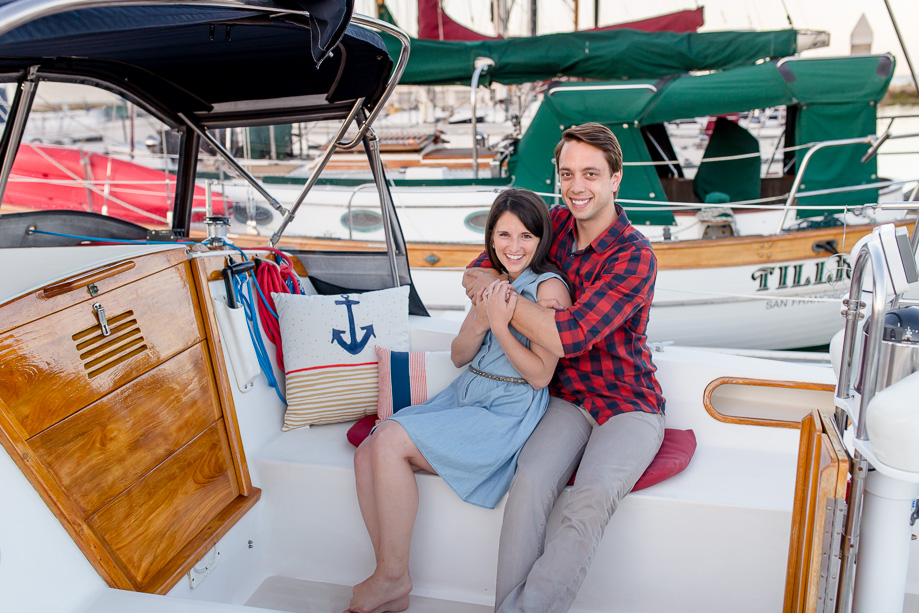 sitting inside a sailboat for couple portraits