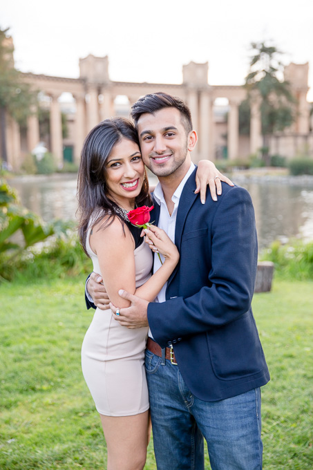 beatiful and bright engagement photo in front of palace of fine arts