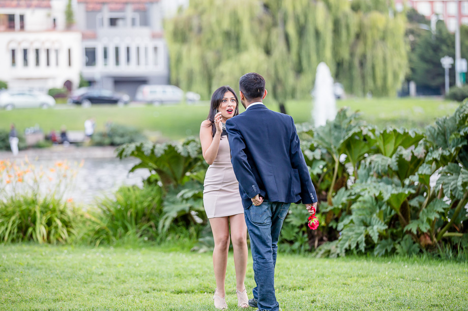 the surprise look on her face is so precious - Surprise Proposal Photography