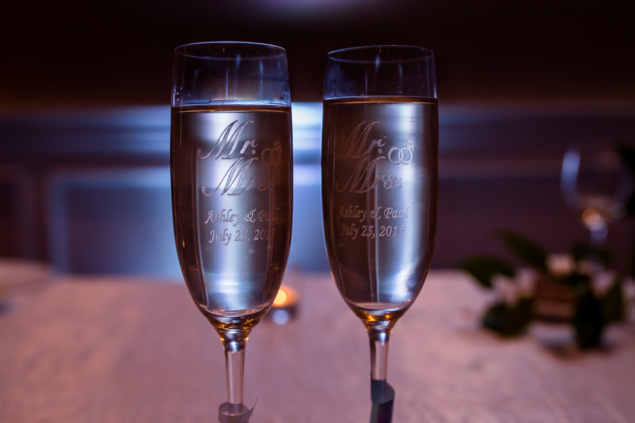 a set of engraved wedding champagne flutes the brides grandparents gifted the newlyweds