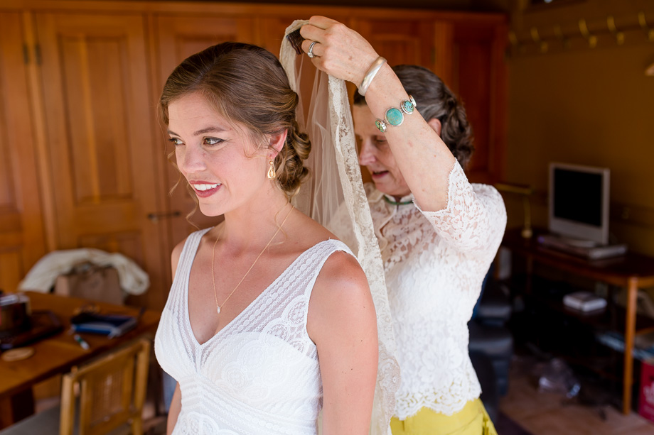 putting on the beautiful lace veil