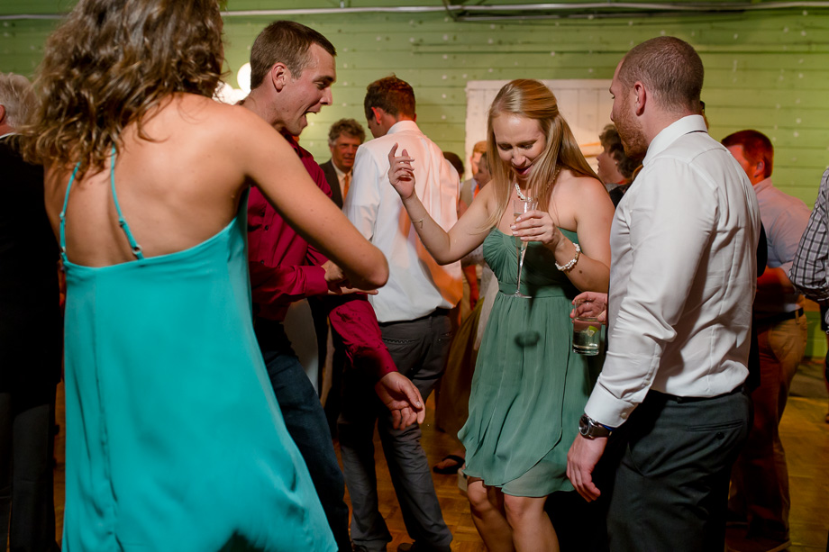 groom's sister dancing with wedding guests