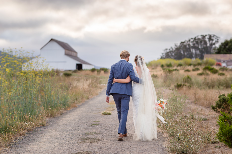 a super romantic candid walking photo of the bride and groom - San Francisco wedding photographer