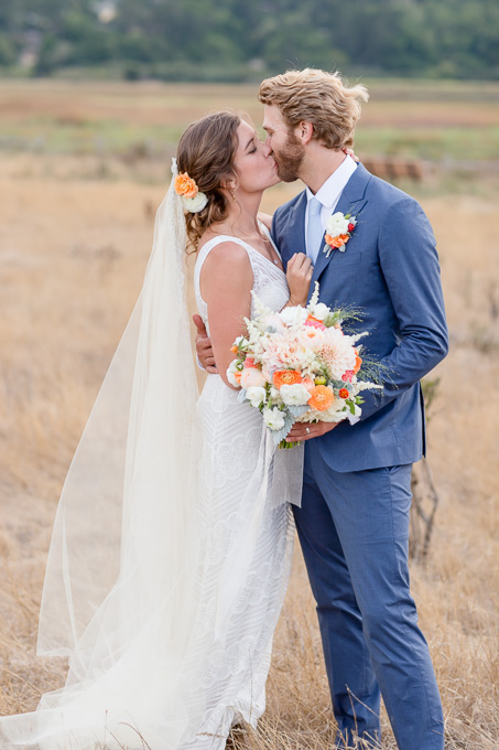 couple sunset portrait in an open field of wild flowers - Pacifica wedding photographer