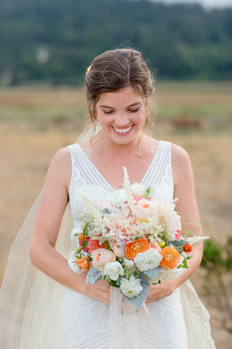 lush bridal bouqet with ivory sheath wedding gown - San Francisco wedding photographer