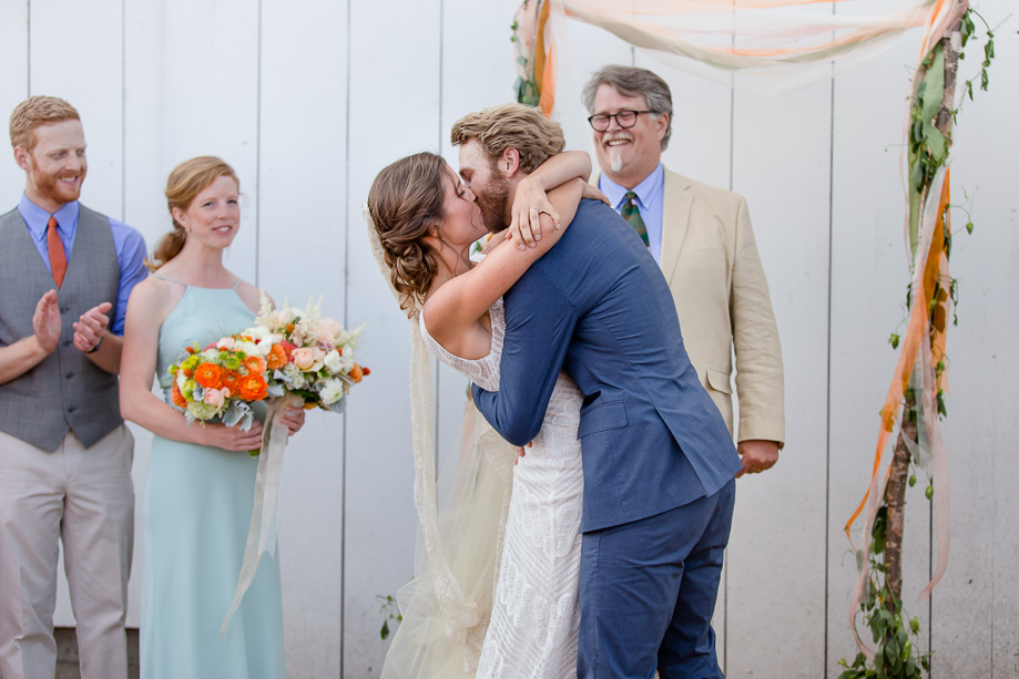 a romantic first kiss as husband and wife - Bay Area lifestyle photographer