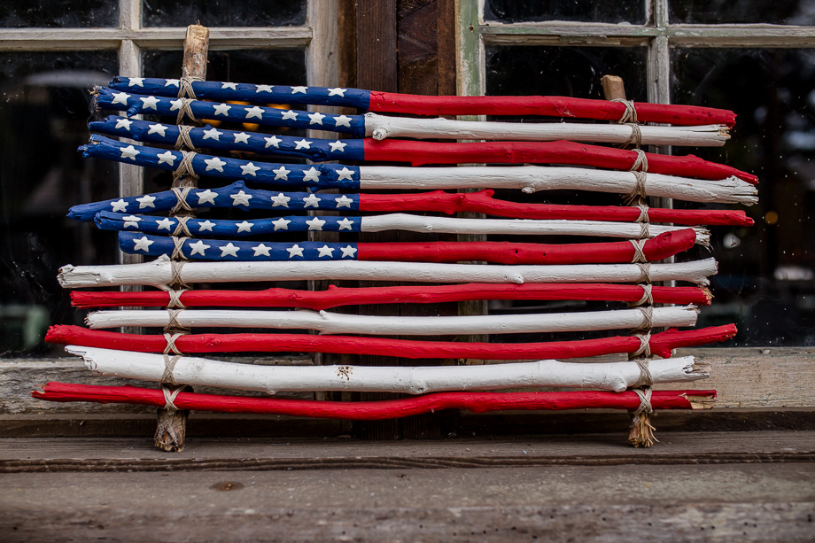an american flag made of wood sticks