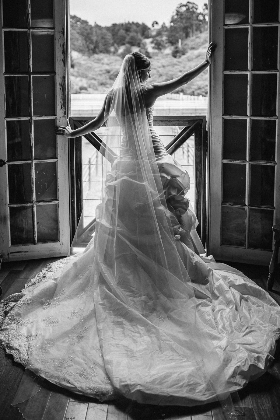 back of a stunning wedding gown - beautiful bridal portrait at long branch saloon and farms