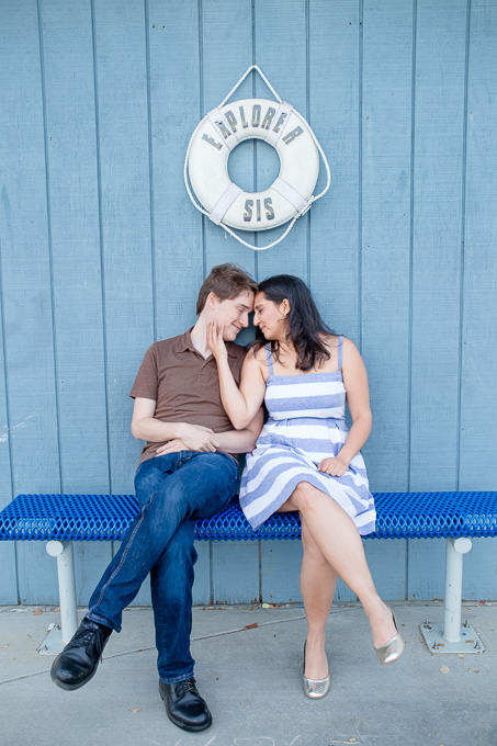 romantic navy blue engagement photo at the pier - Bay Area wedding photographer