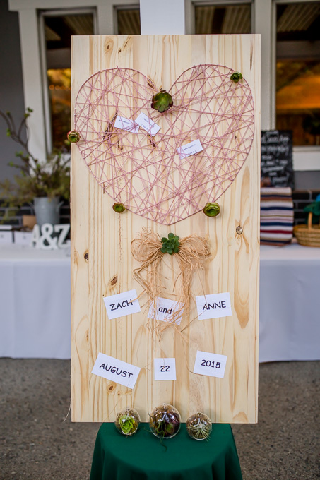 cute rustic wooden wedding welcome sign with succulents