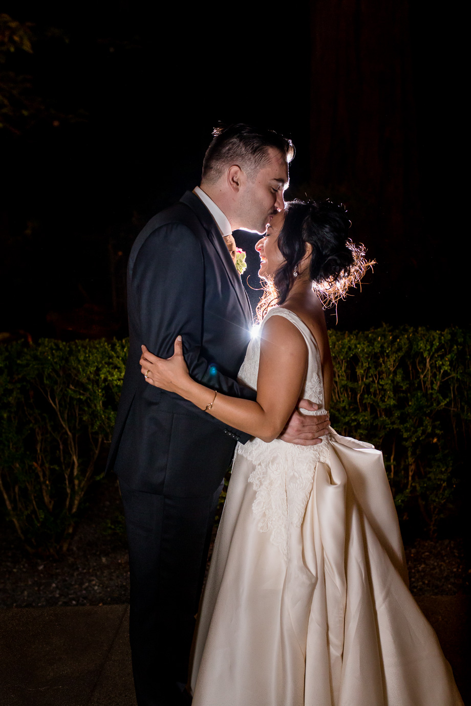flash photo kiss on the forehead at the end of a wedding night