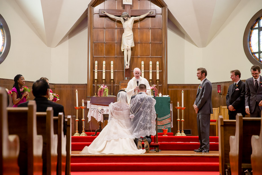 a traditonal veil and cord wedding ceremony at St. Anselm Catholic Church