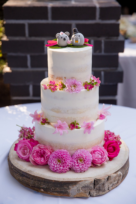 wedding cake with cute mouse cake toppers