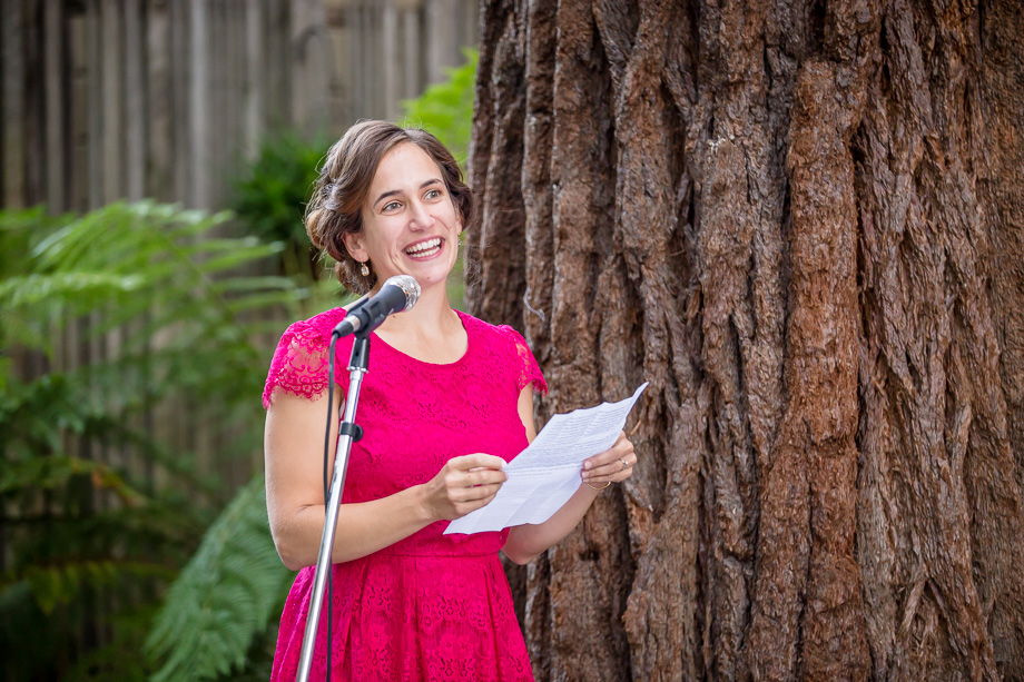 bridesmaid giving toast by redwood tree