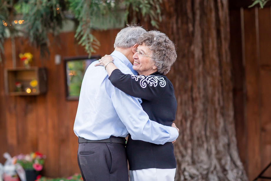 precious moment of grandparents dancing at the wedding reception