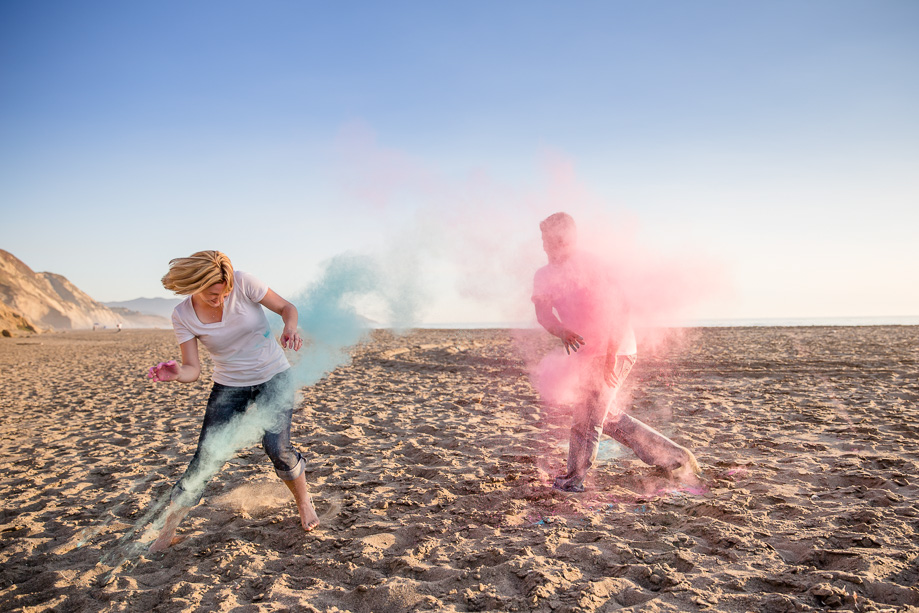super fun paint war engagement photo on a beach - silicon valley lifestyle photographer