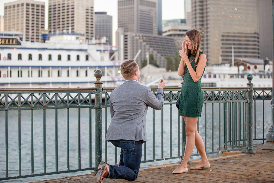 a romantic suprise proposal at Embarcadero pier seven in San Francisco