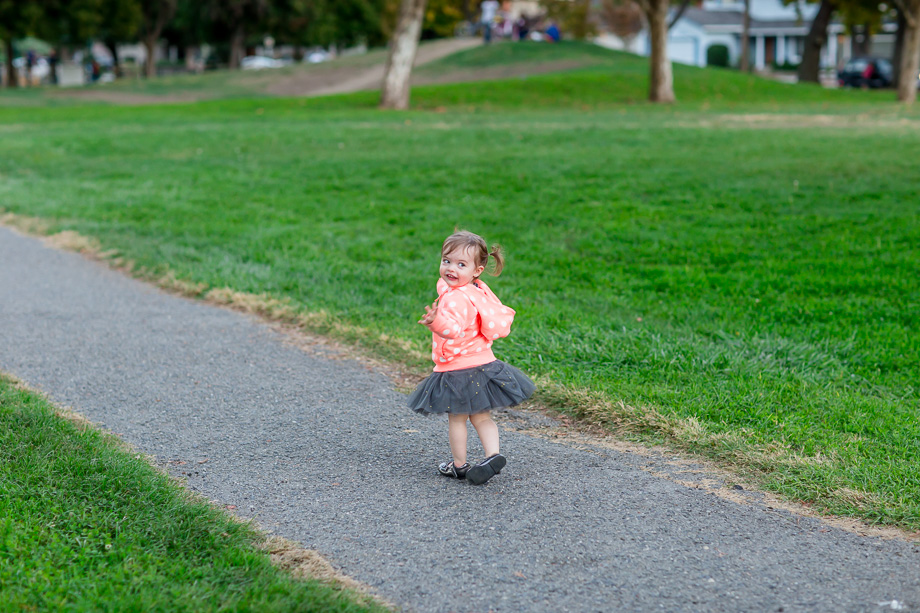 cute girl running in park