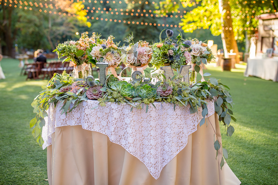 gorgeous lush floral design for the sweetheart table at Saratoga Springs