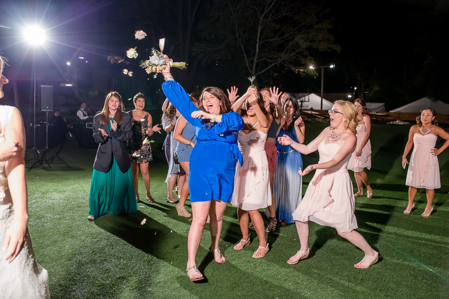 girl catches bouquet toss at Saratoga Springs