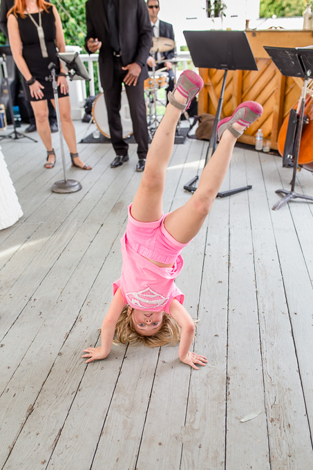 little girl doing a handstand