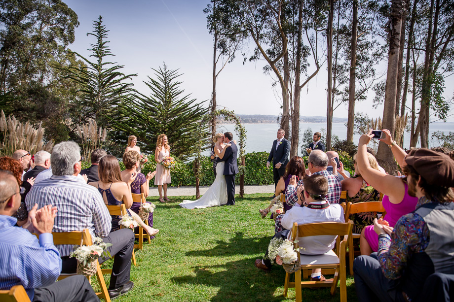 first kiss during wedding ceremony at Monarch Cove Inn