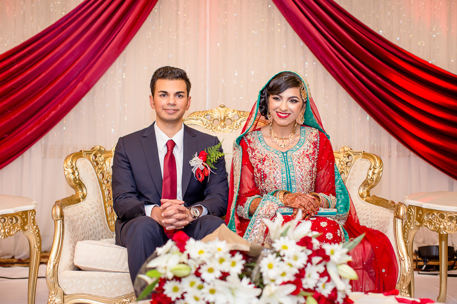 bride and groom on the stage of Chandni restaurant - hayward wedding photographer