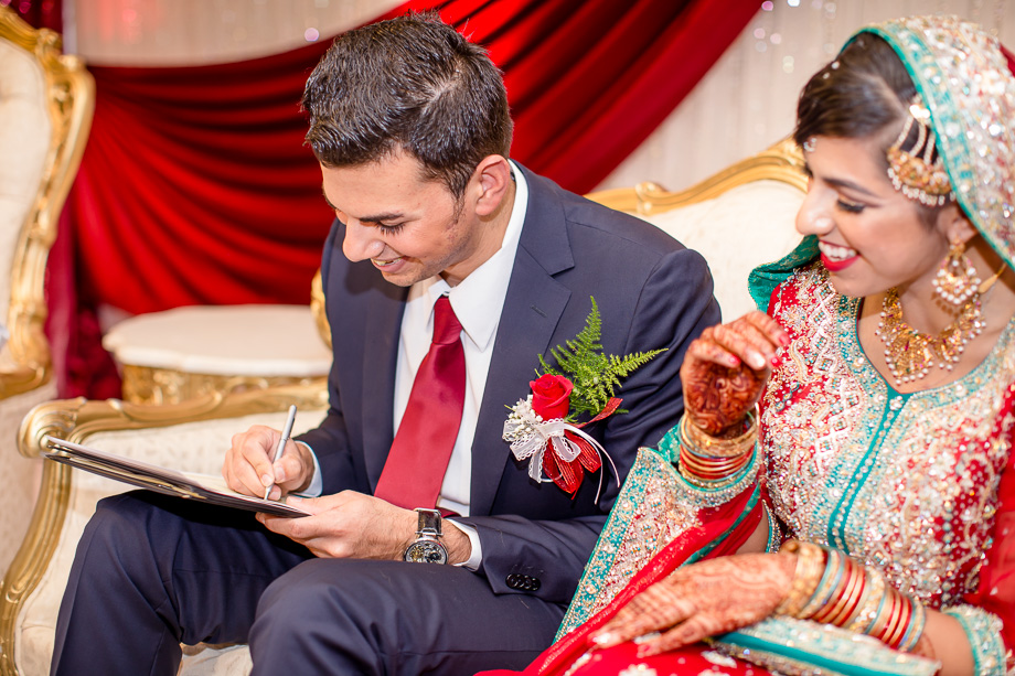 signing the document at the nikah ceremony - bay area muslim wedding photographer
