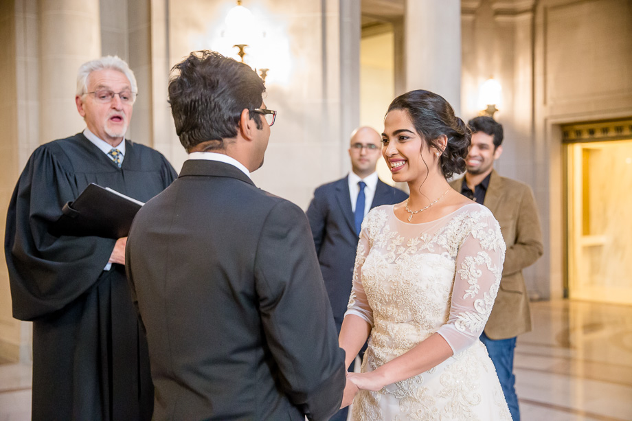 an intimate and emotional moment during the SF city hall wedding ceremony
