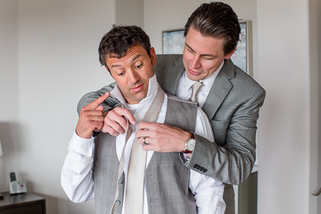 funny groom getting ready photo