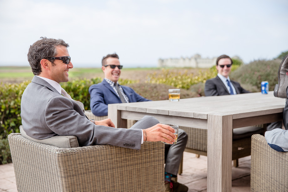 groom and boys drinking/chilling before ceremony - half moon bay wedding photographer