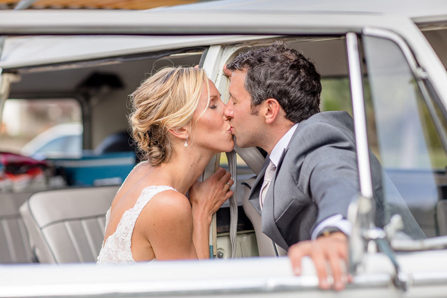 kissing in a Volkswagen bus