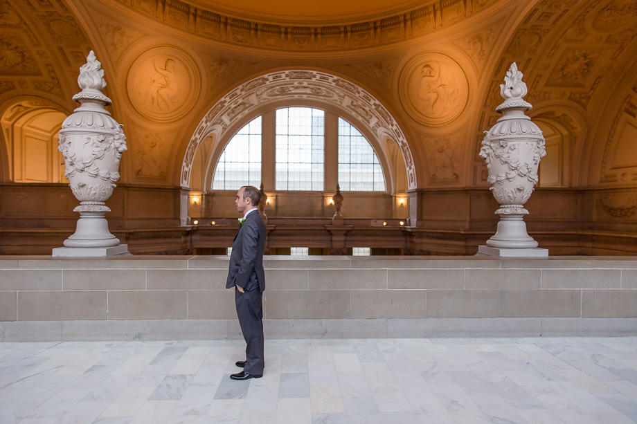 groom waiting for his bride at SF city hall third floor for their first look
