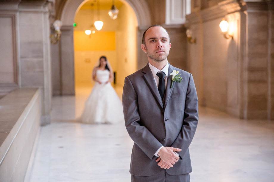 romantic first look at SF city hall before their wedding ceremony and reception