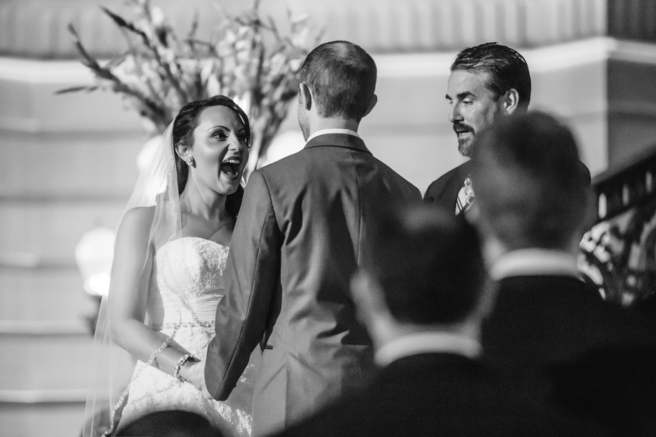 cute moment before being announced as husband and wife - Bay Area wedding photographer