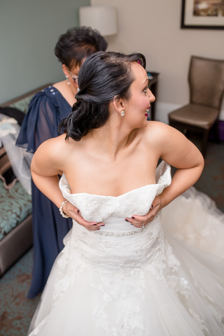 bride putting on her dress at the WorldMark