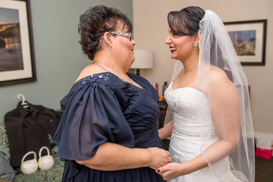 a cute moment between the bride and her mother