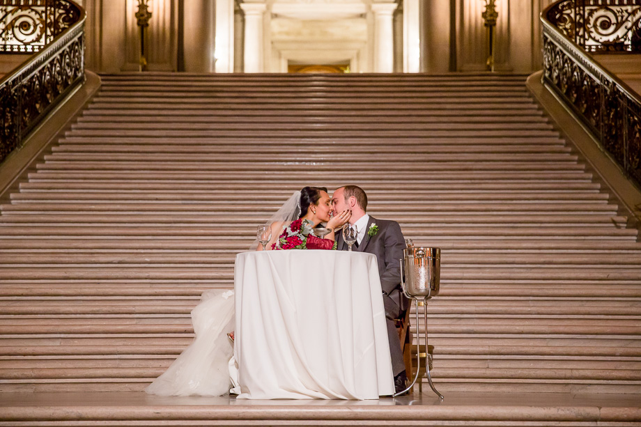 San Francisco City Hall grand wedding - sweetheart table on the grand staircase