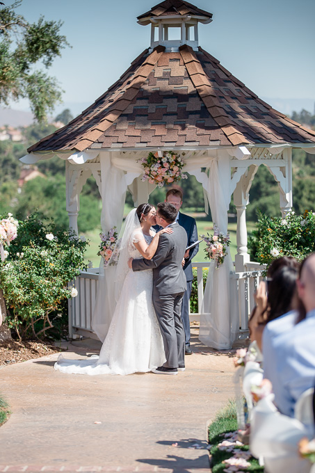 couples first kiss as husband and wife - Riverside CA wedding