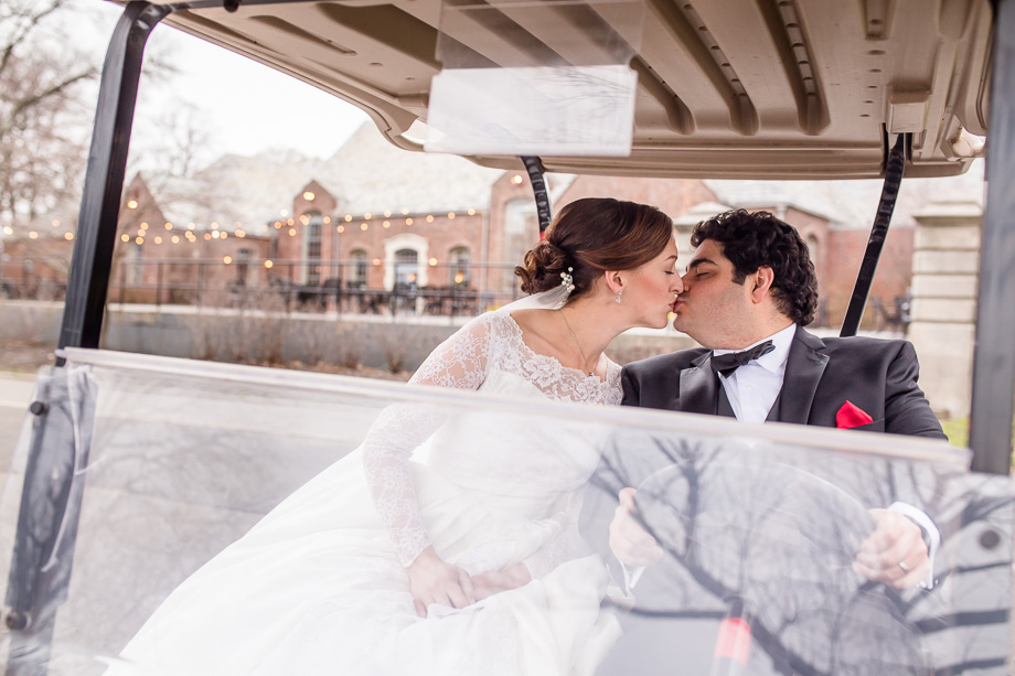 kissing in a golf cart - brooklyn golf course wedding