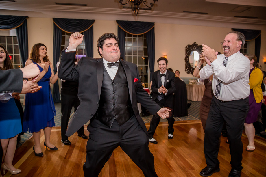 groom showing his dance moves at the reception party - dyker golf couse