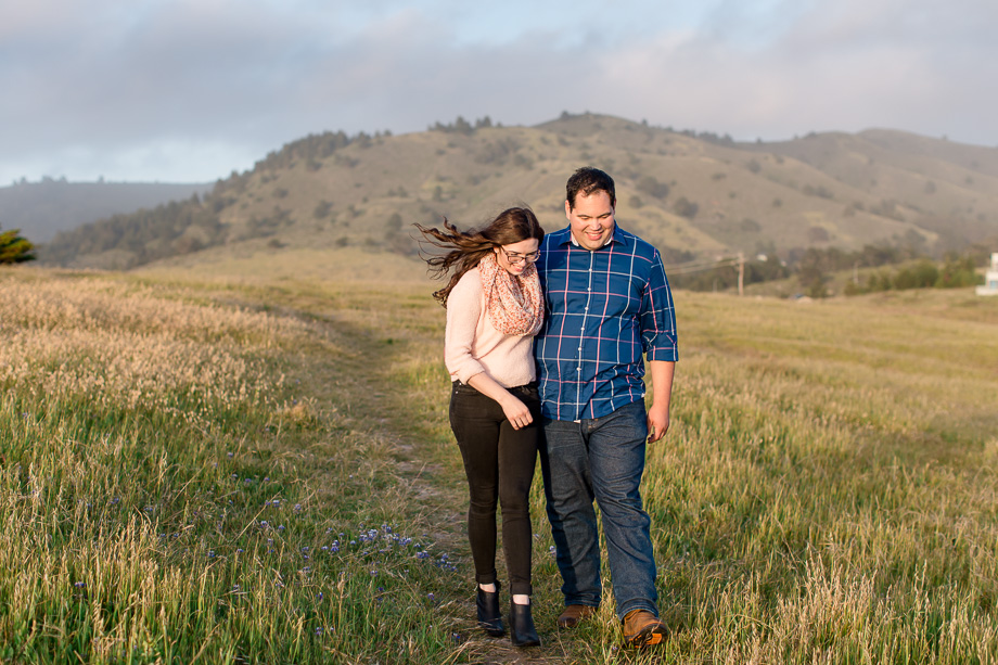seaside engagement photo at a beautiful open field