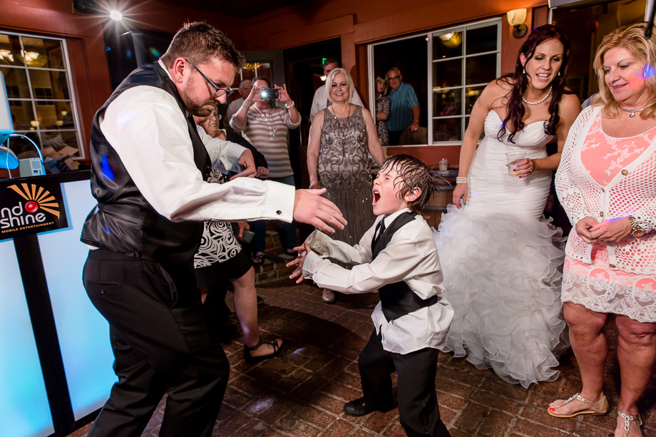 groom and son dancing at Mama Mias Restaurant