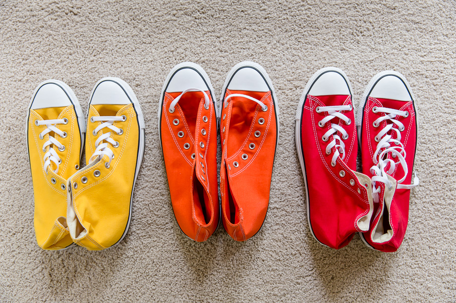 colorful converses for rainbow themed wedding