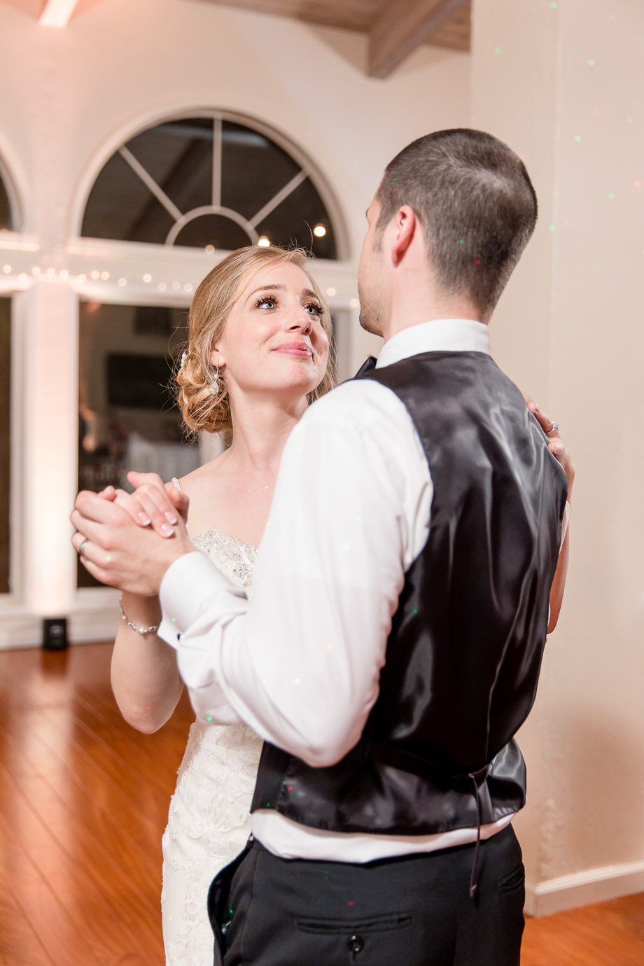 bride looking at groom during first dance