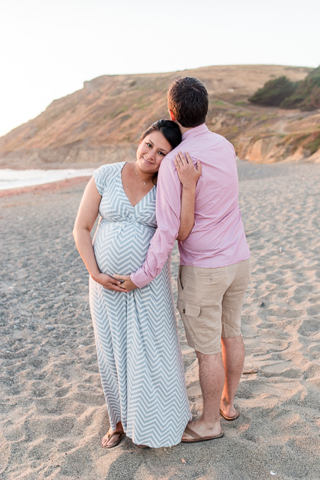 sunset maternity-family photo on the beach facing pacific ocean
