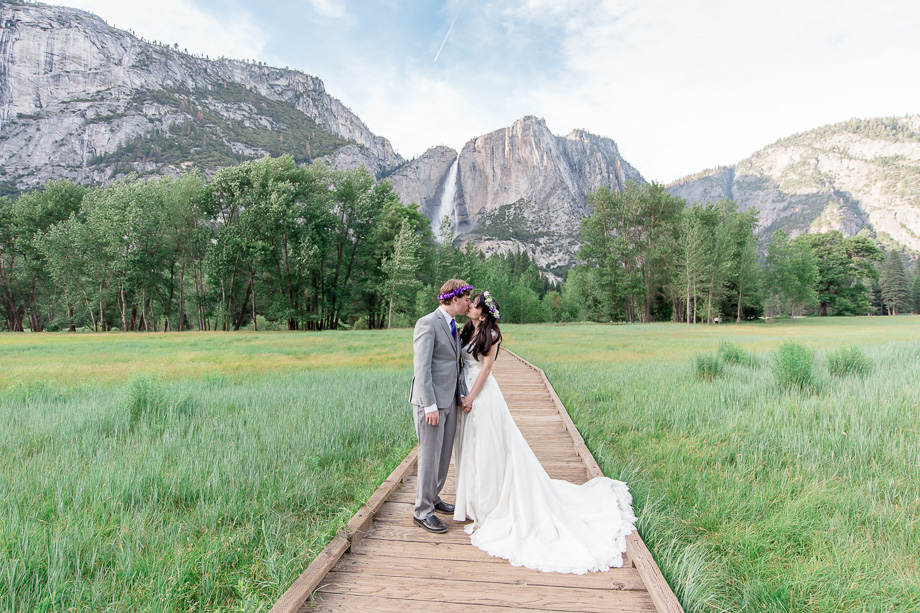 beautiful wedding photo at the meadow in front of Yosemite falls